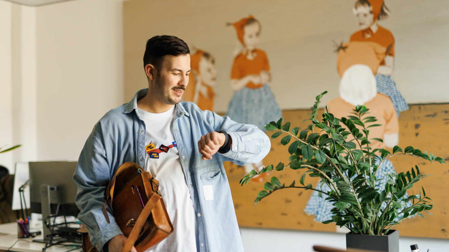 man looking at a watch