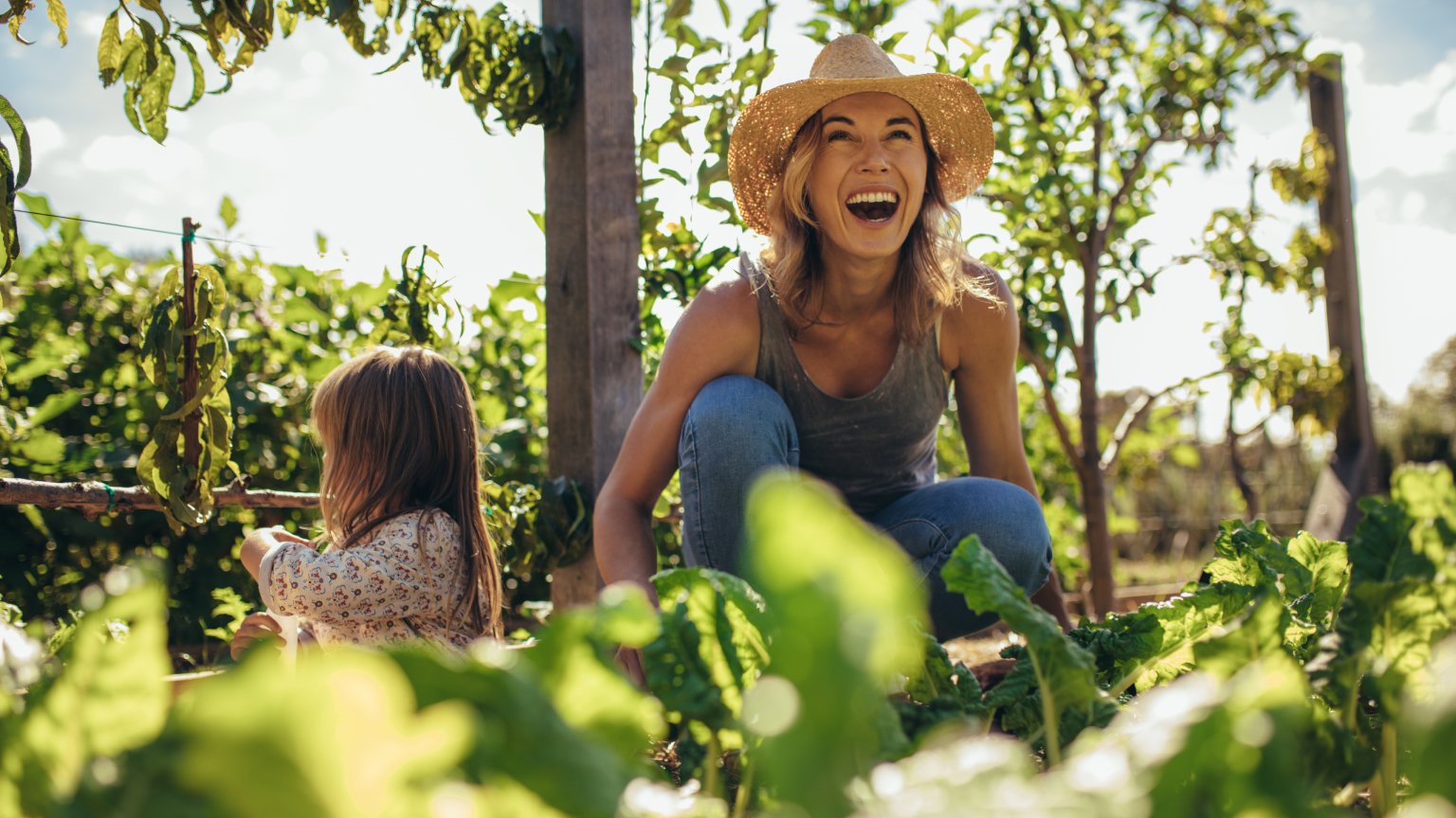 woman with child in garden