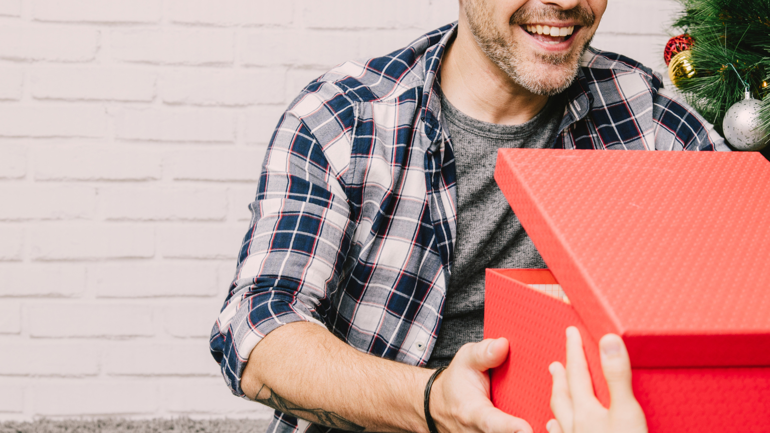 Smiling-man-receiving-present