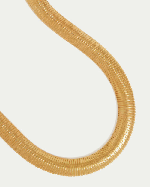 Something Navy x SORU Gold Snake Necklace flat lay