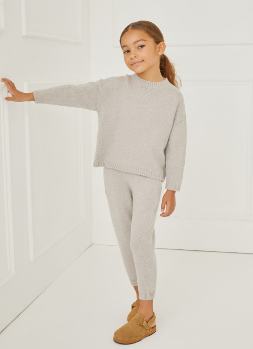 Model in Kids Turtleneck Sweater and Knit Joggers in Oatmeal