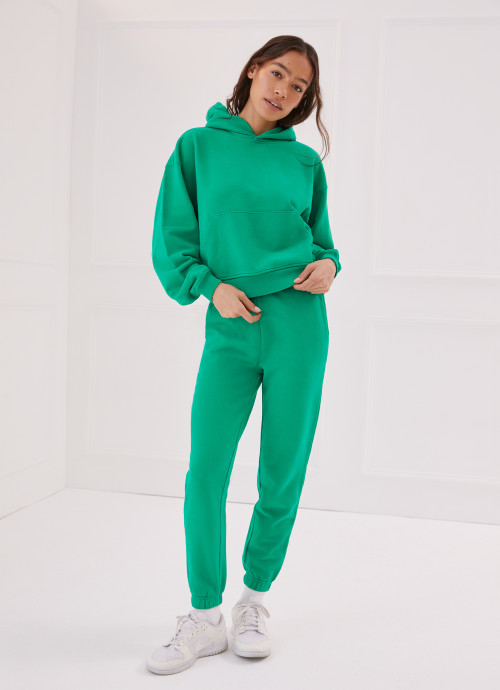 Model in Classic Sweatpants and Hoodie in Kelly Green