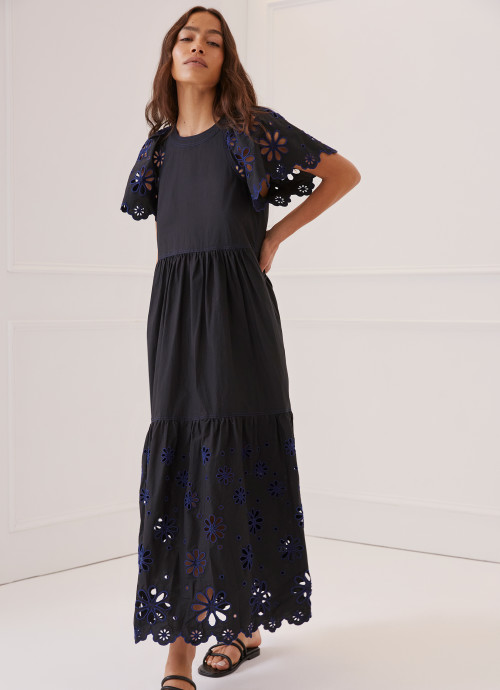 Model in Embroidered Tiered Dress in black