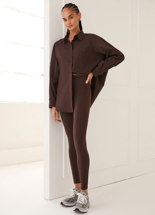 Model in Cropped Leggings and Classic Button Up in Brown