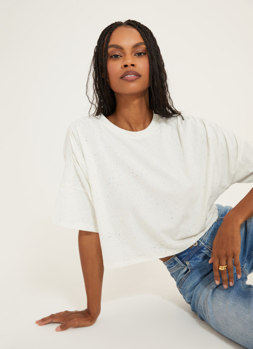 Model in Pleated Shoulder Cropped Tee in White