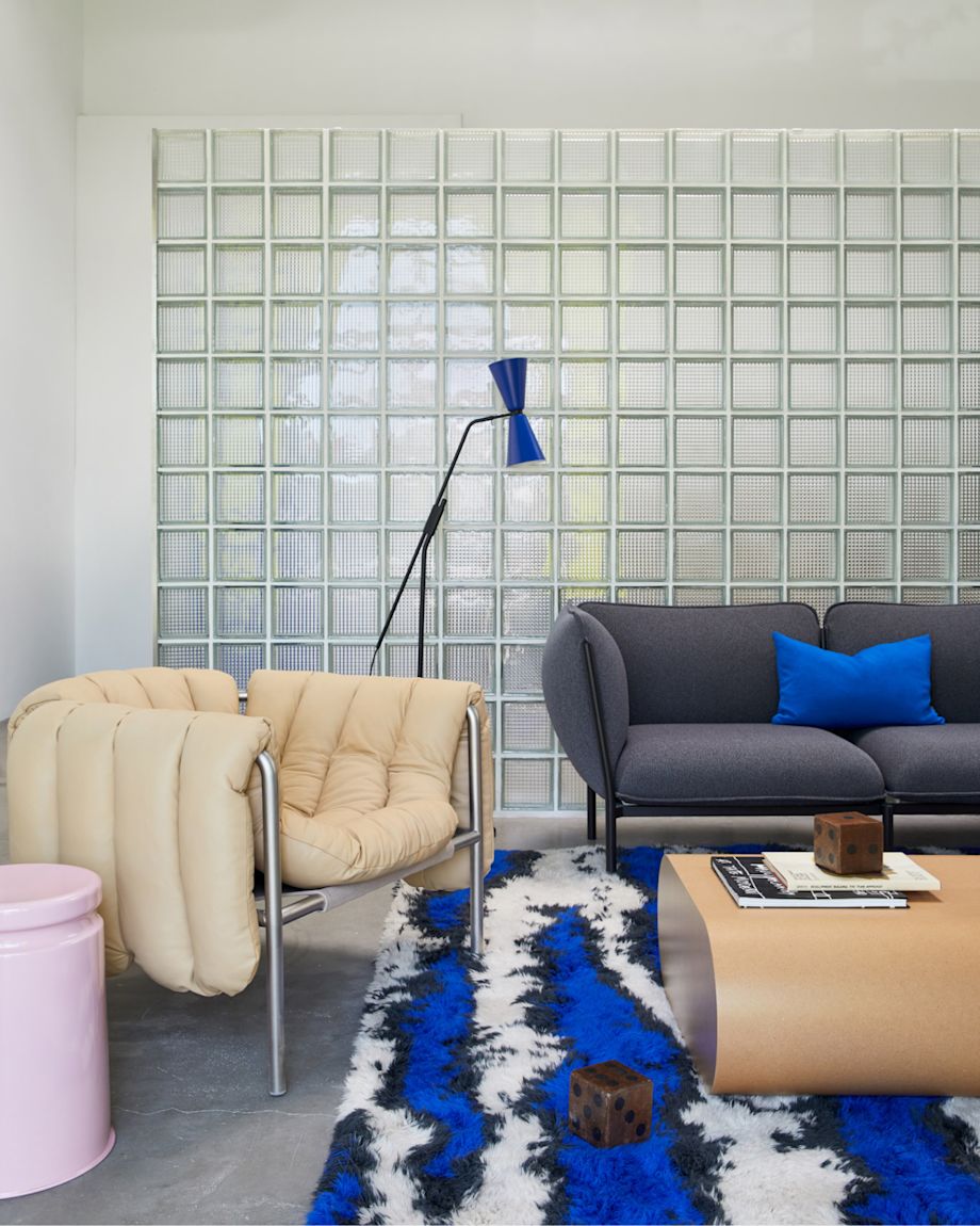 Image of the Hem LA Showroom featuring Puffy Lounge Chair, Alphabeta Floor Lamp, Monster Rug, Kumo Sofa, Storm Cushion, Last Stool and Stump Coffee Table.