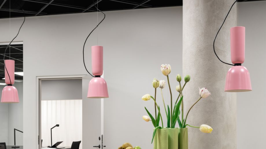 A lifestyle image of an office setting featuring Alphabeta Pendant Lights.