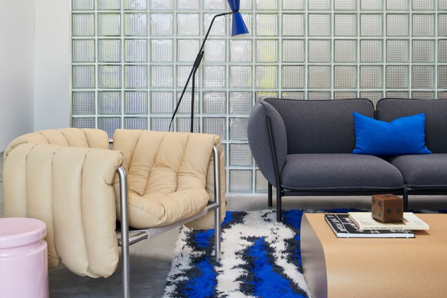 A lifestyle image from the Hem LA Showroom featuring Kumo Sofa, Alphabeta Floor Lamp, Puffy Lounge Chair, Stump Table, Monster Rug and Last Stool.
