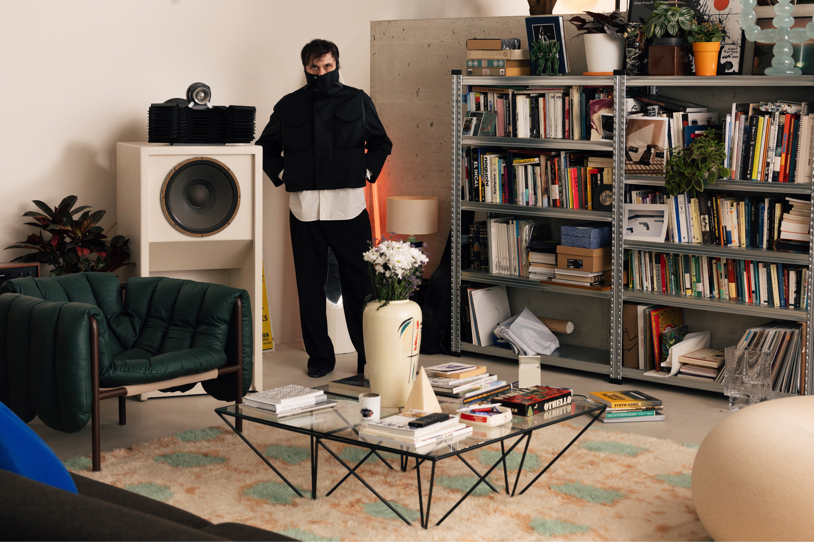 An editorial image featuring Puffy Lounge Chair, Bubble Candelabra, Boa Pouf, and Monster Rug.