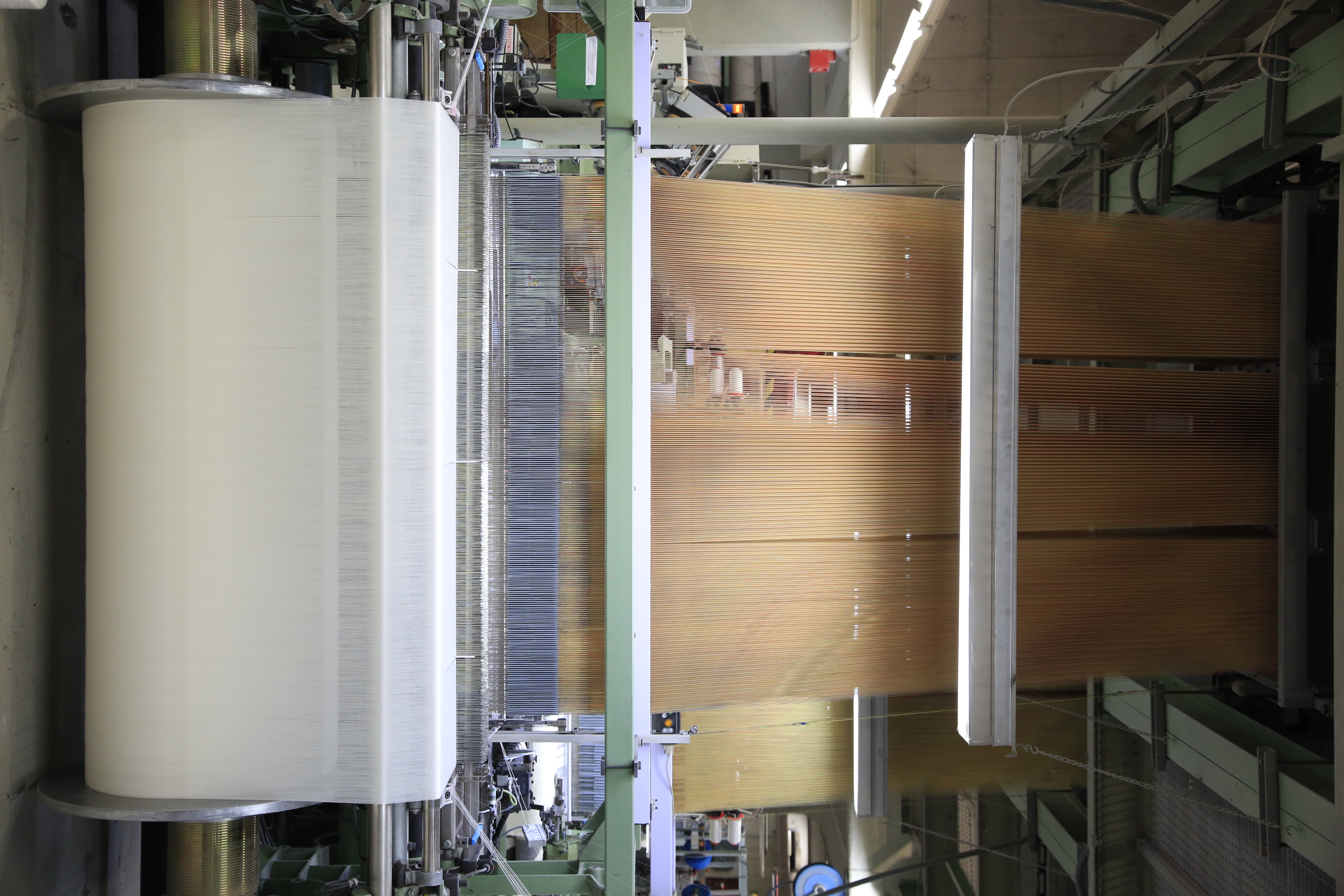 An editorial image from behind the scenes at the Palo Sofa textile factory.