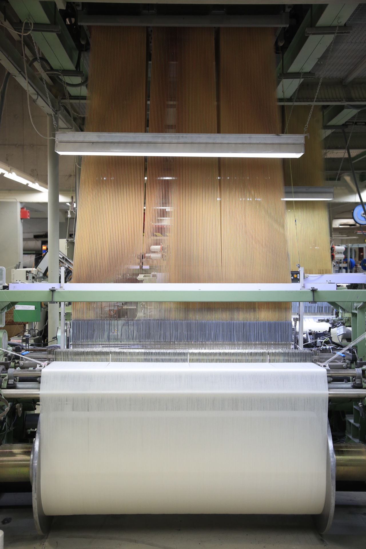 An editorial image from behind the scenes at the Palo Sofa textile factory.