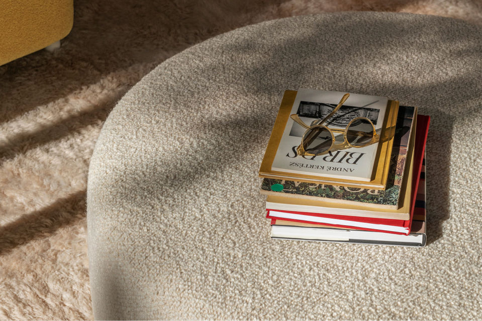 A lifestyle image of a lounge scene featuring Bon Pouf Round Large.