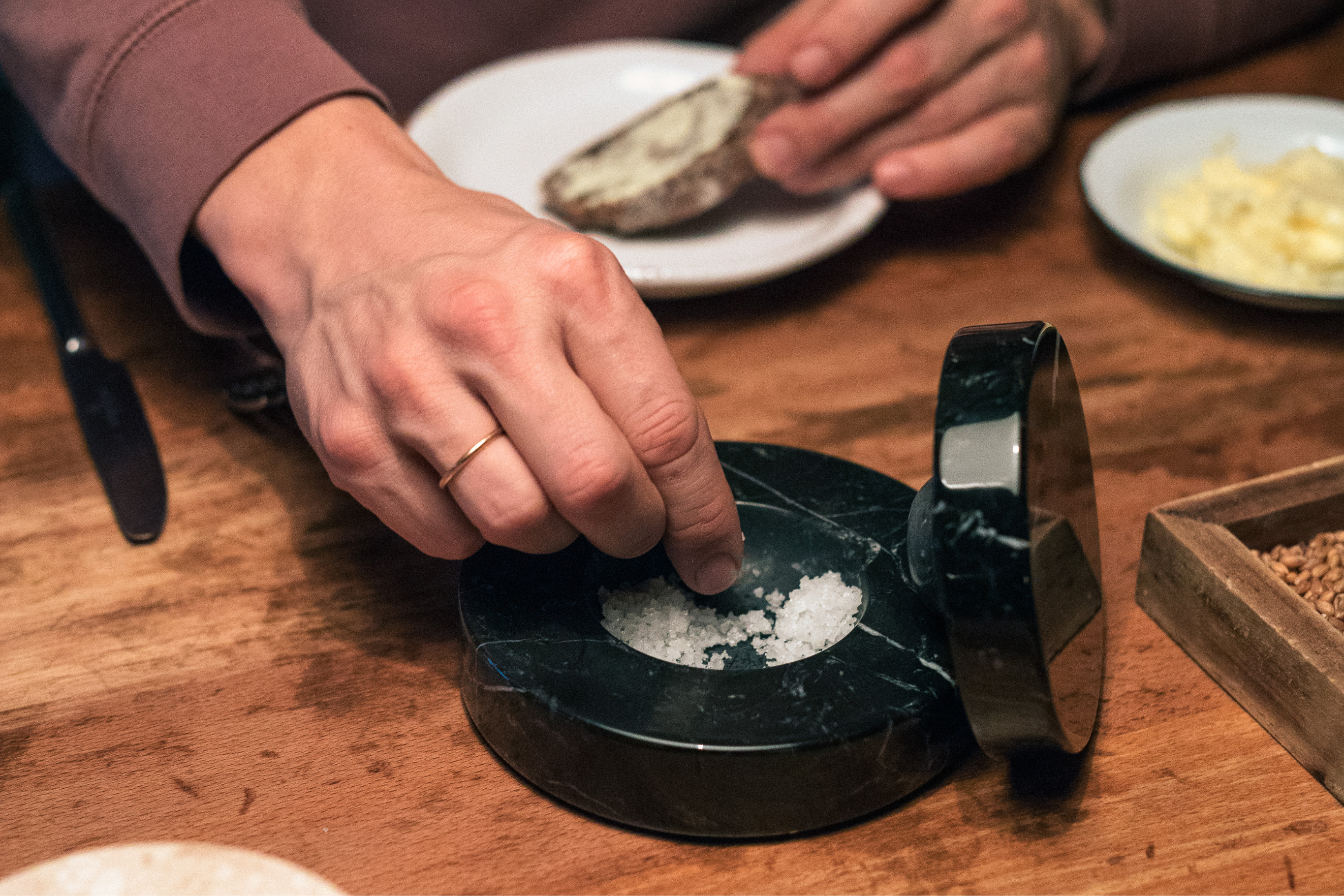 A lifestyle image of a dining scene featuring Table Mortar.