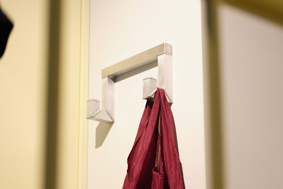 A lifestyle image of a hallway featuring Tig Hook Double.