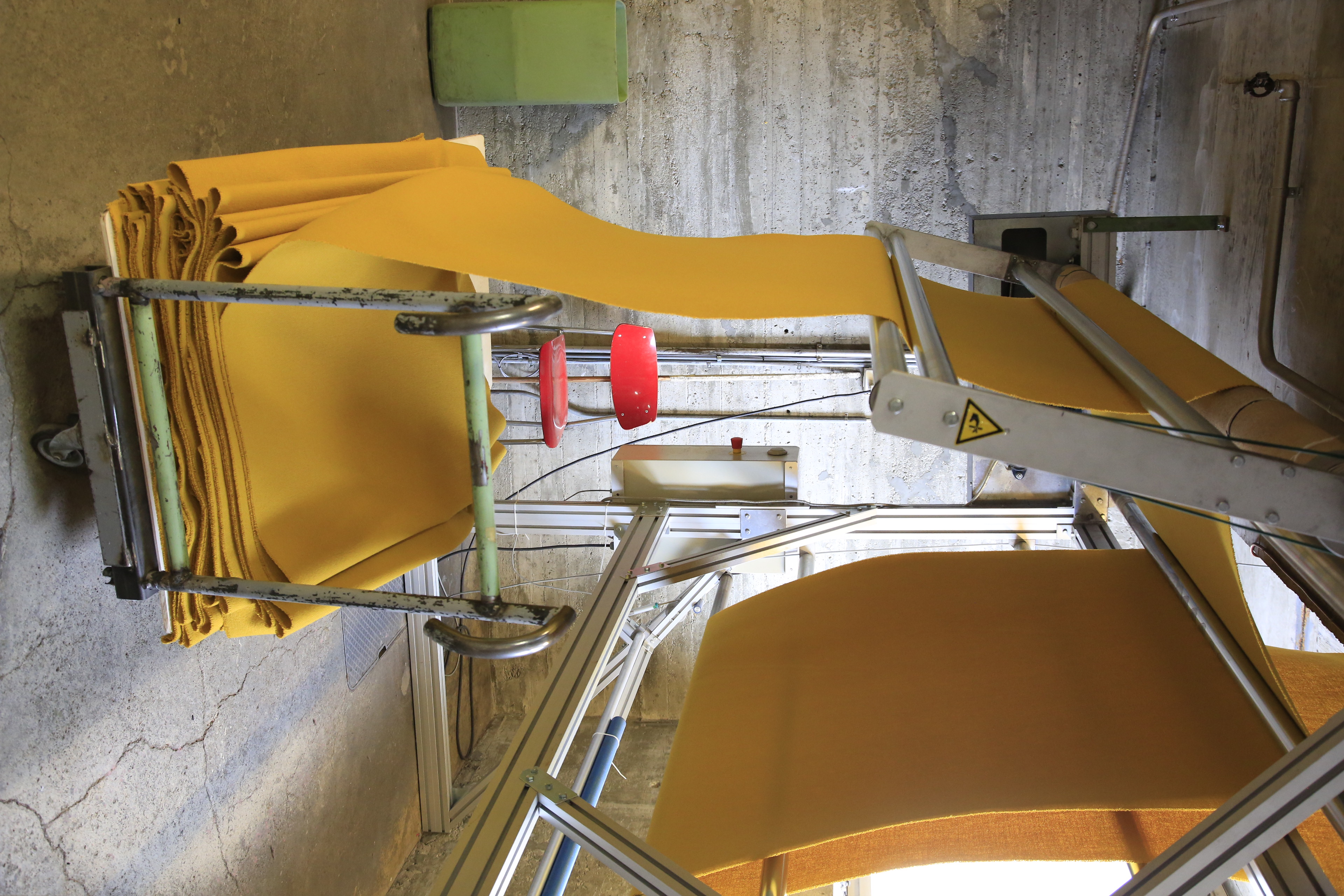 An editorial image from behind the scenes at the Palo Sofa textile factory.