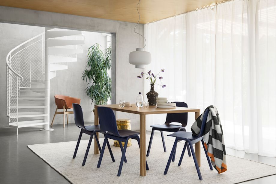 Hem - A lifestyle image of a dining room scene featuring Touchwood Chairs, Dune Rug, Pocket Armchair, Log Table, Dusk Lamp, Stripe Throw and more.