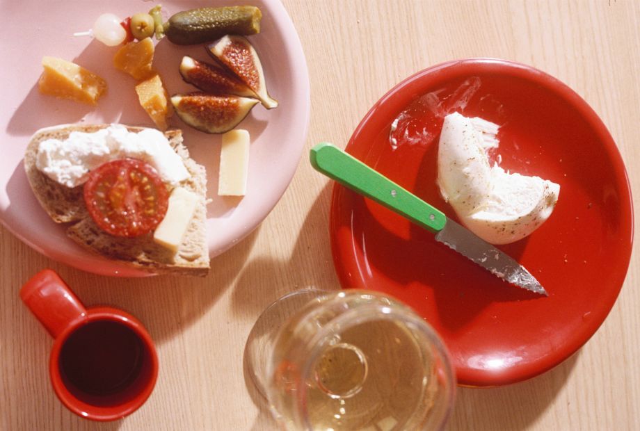 A lifestyle image of a dining scene featuring Bronto Tableware - Plates and Espresso Cups.