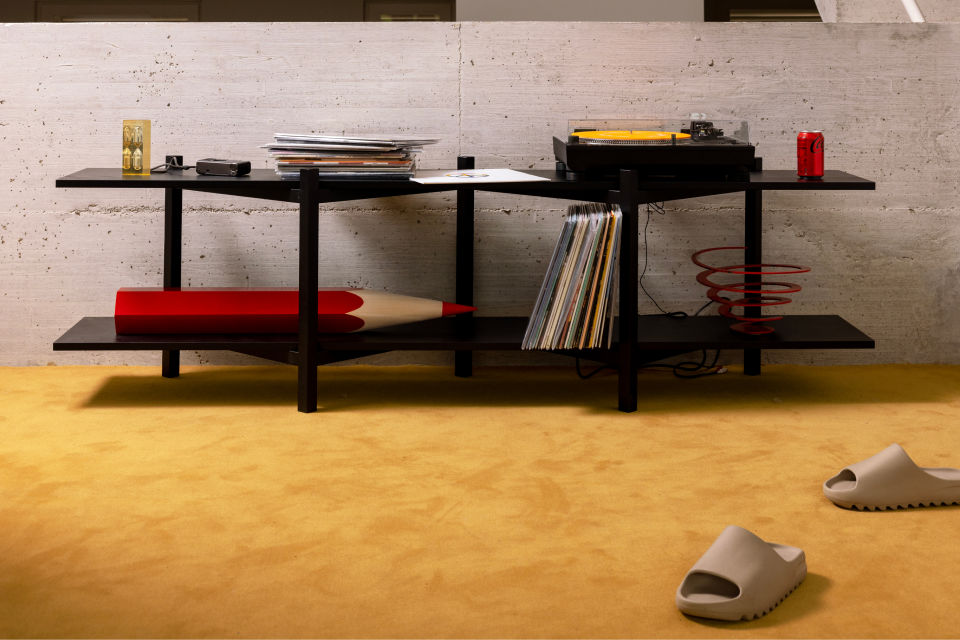 A lifestyle image featuring Zig Zag Media Shelf in Black.