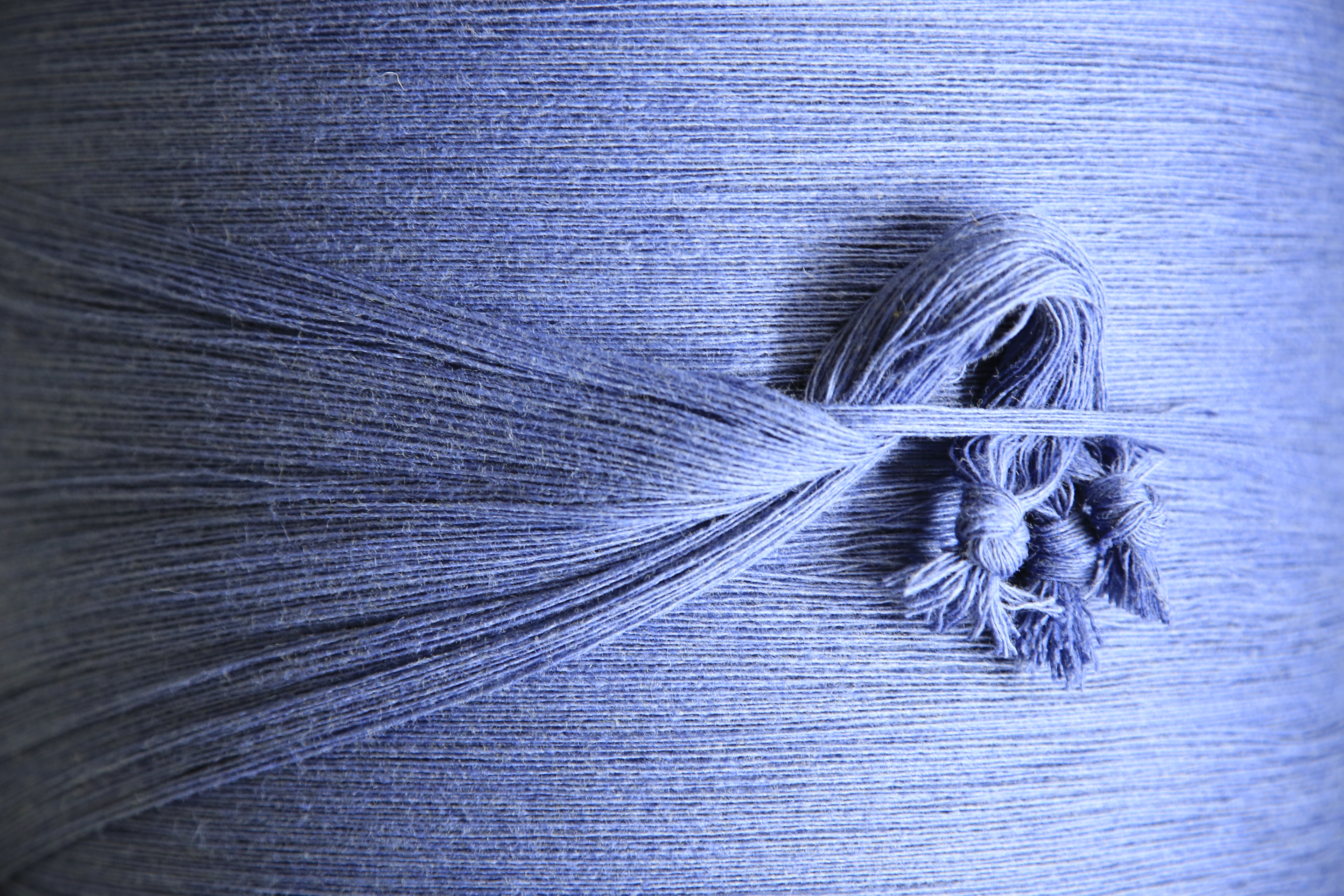 An editorial image from behind the scenes at the Palo Sofa textile factory.