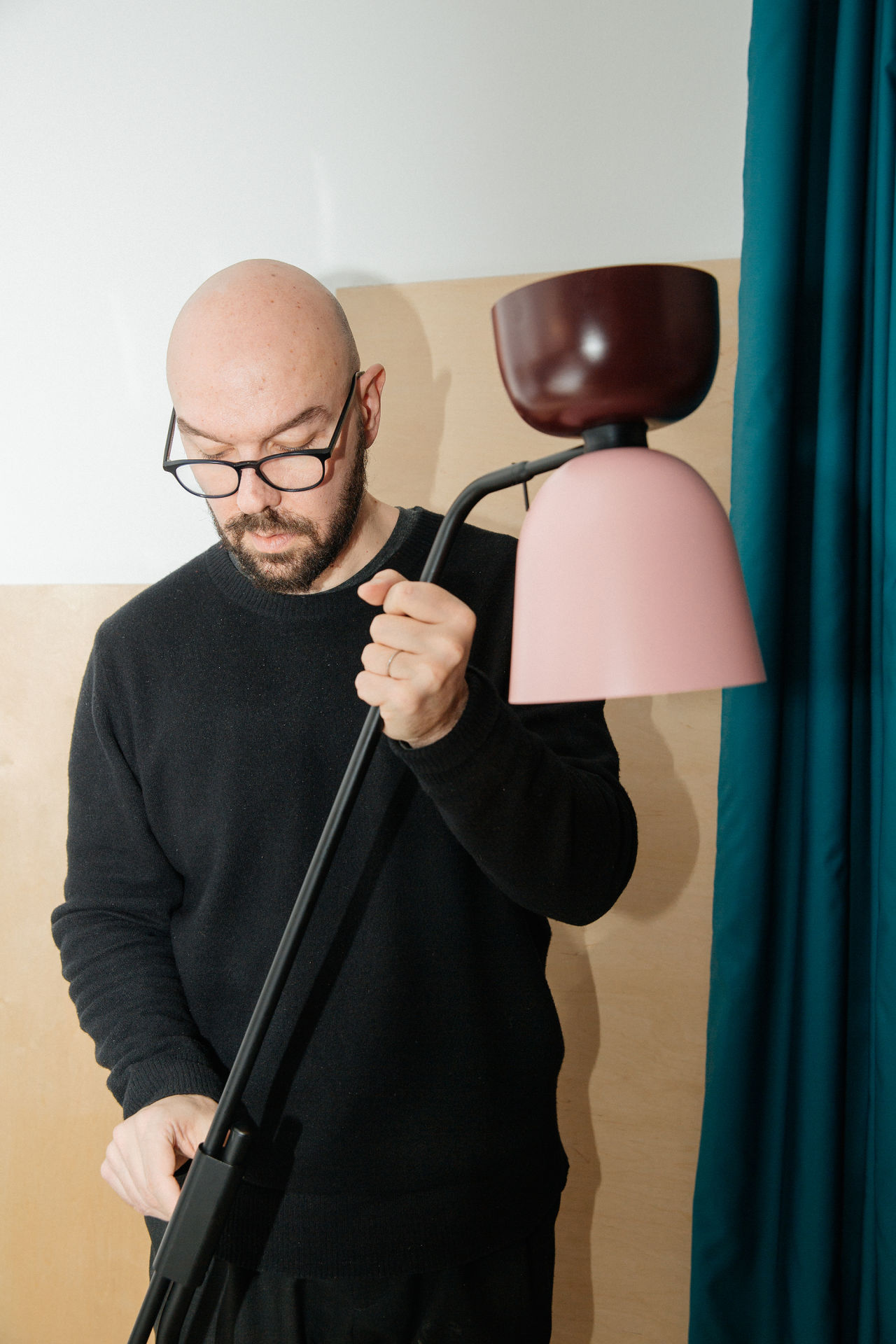 An editorial image from behind the scenes with Luca Nichetto, the designer behind Alphabeta Floor Lamp.
