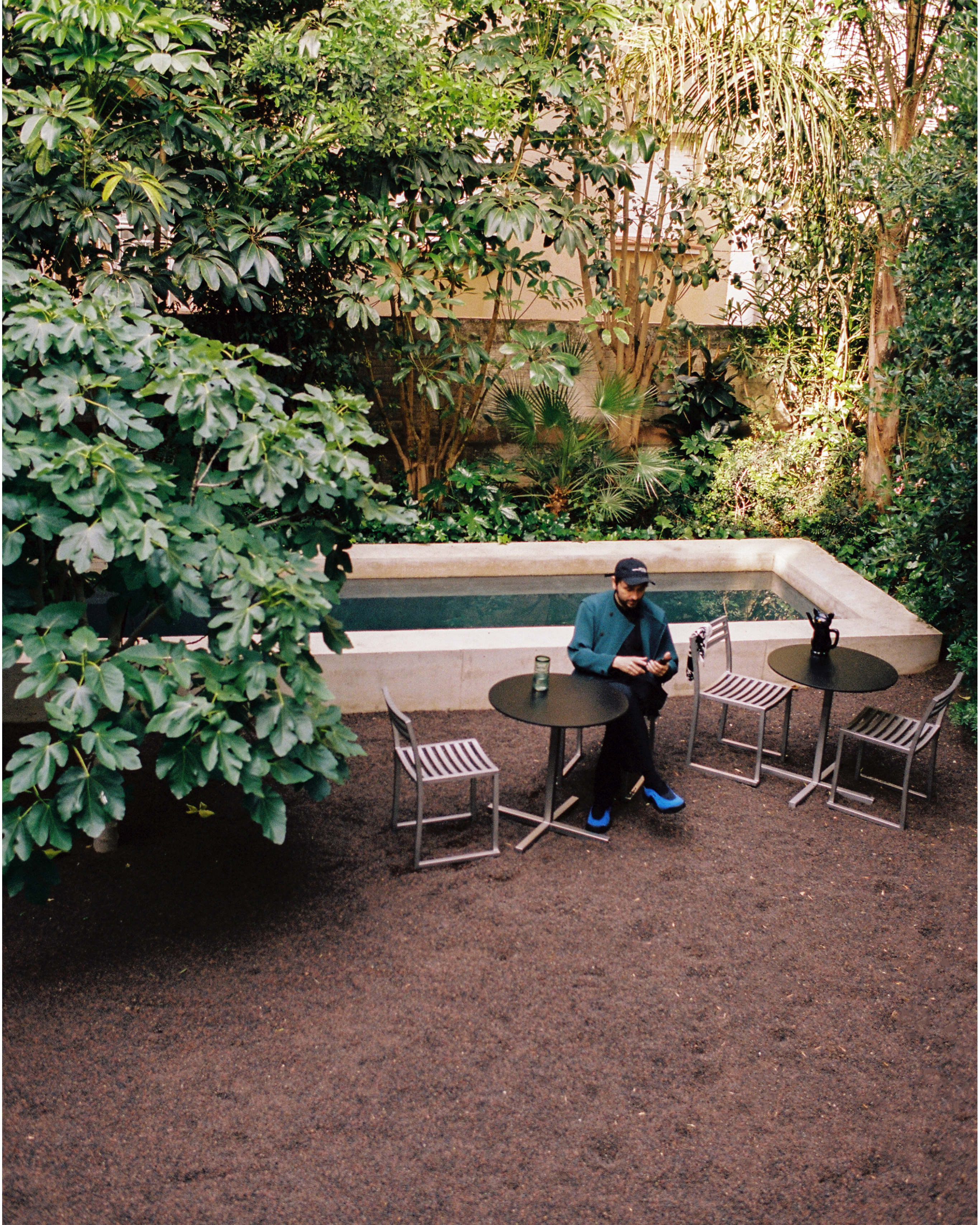 Oriol lounging with our [Chop Chairs (Set of 2) Stainless](/furniture/chairs-and-stools/chop/30816) and [Chop Table Round Laminate / Stainless](/furniture/tables-and-side-tables/chop/30820).