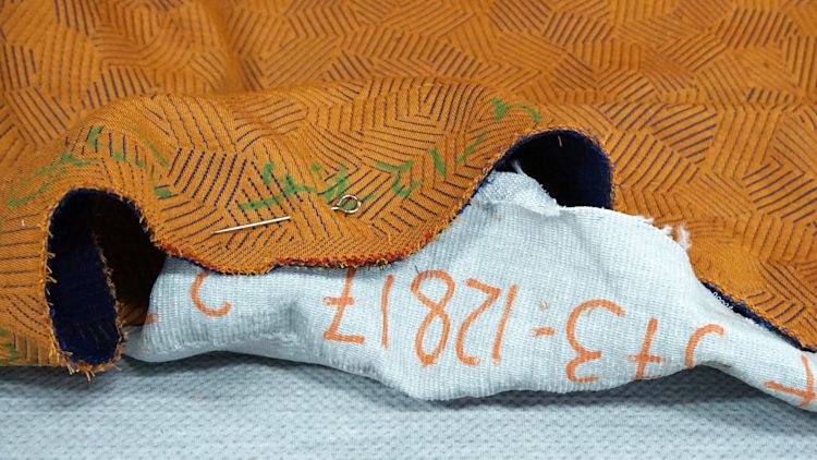 An editorial image from behind the scenes of the factory that makes the fabric for Hem's Hai Lounge Chairs and Bon Poufs.