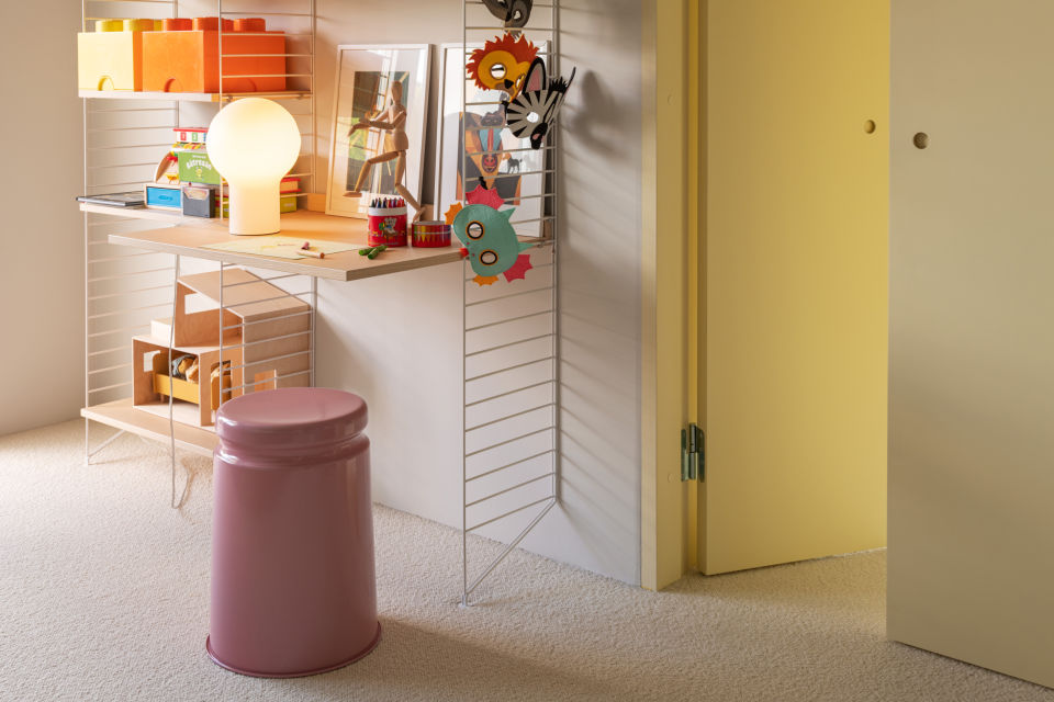 A lifestyle image of an office scene featuring Last Stool and Coco Table Lamp.