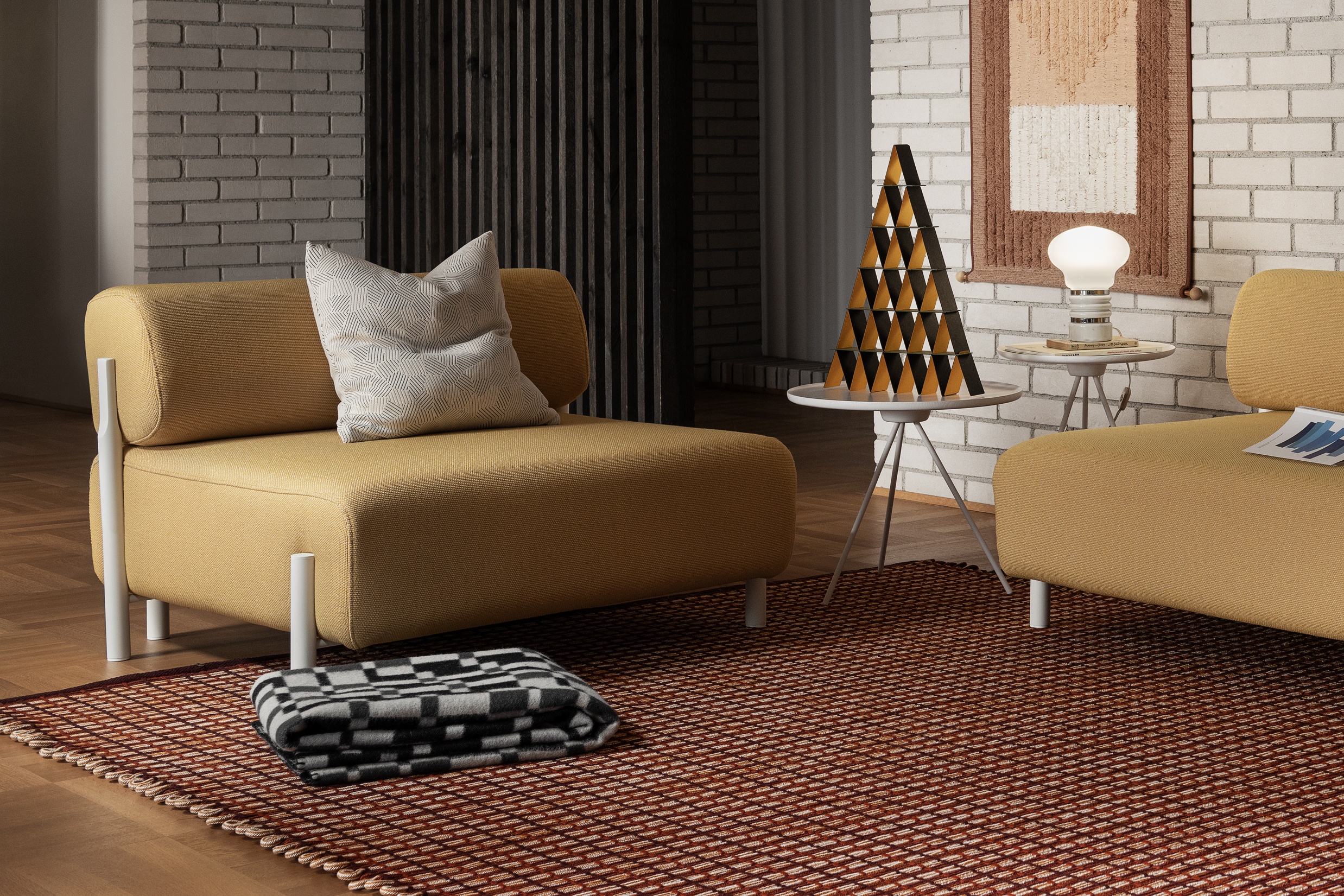 Hem - A living room scene featuring Palo Modular Sofa, Storm Cushion Medium, Key Side Table, Key Coffee Table, Incredible House of Cards, Vienna Throw, and Rope Rug.