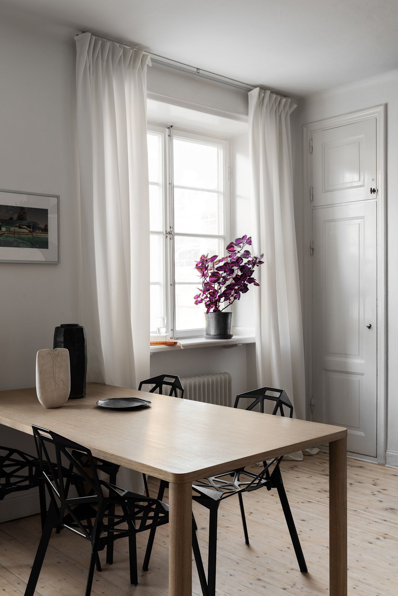 An editorial image of a kitchen scene featuring Log Table.