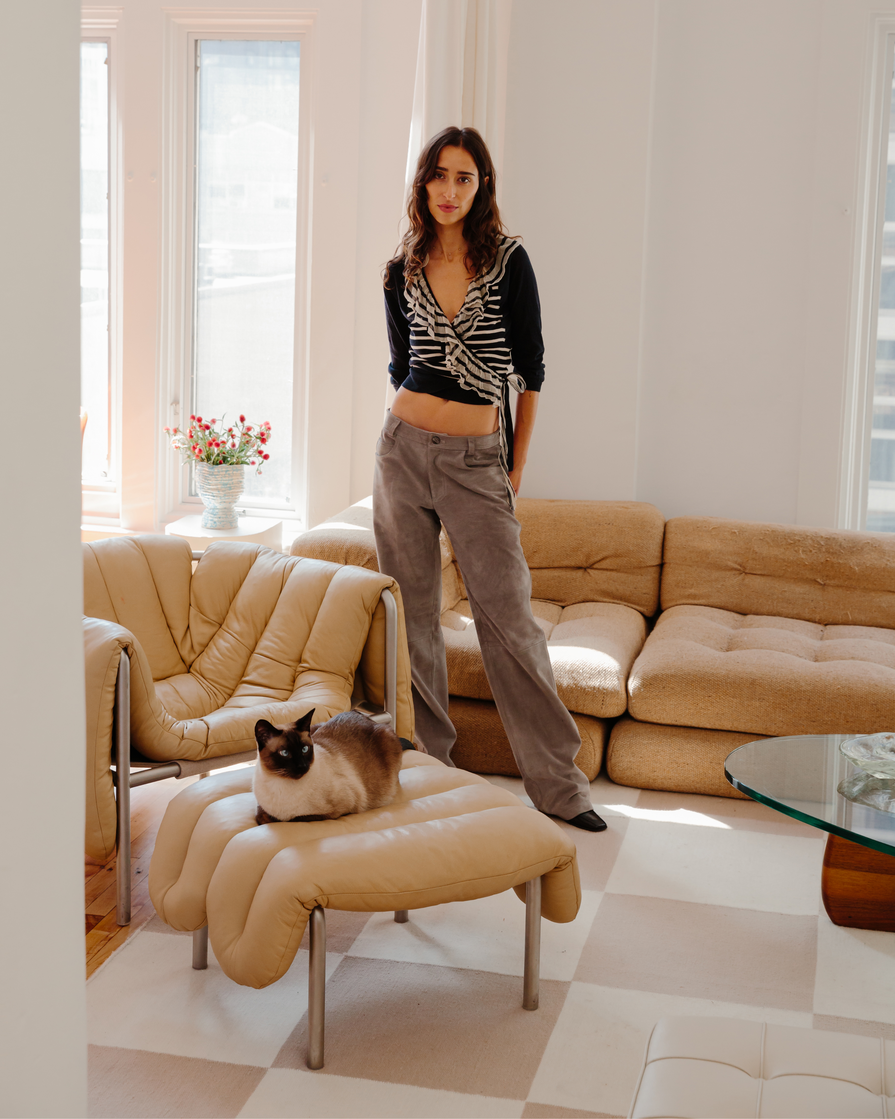 Chloe's cat enjoying the [Puffy Lounge Chair + Ottoman Sand / Stainless](/furniture/chairs-and-stools/puffy/20309)