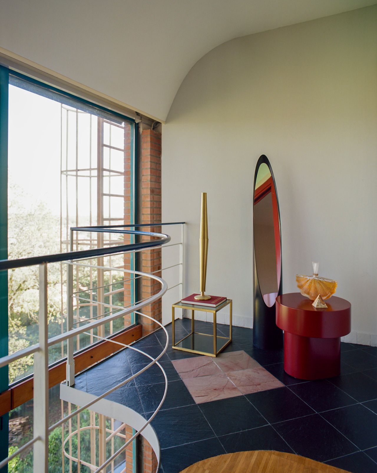 A lifestyle image of a hallway scene featuring Stump Side Table Wine Red.