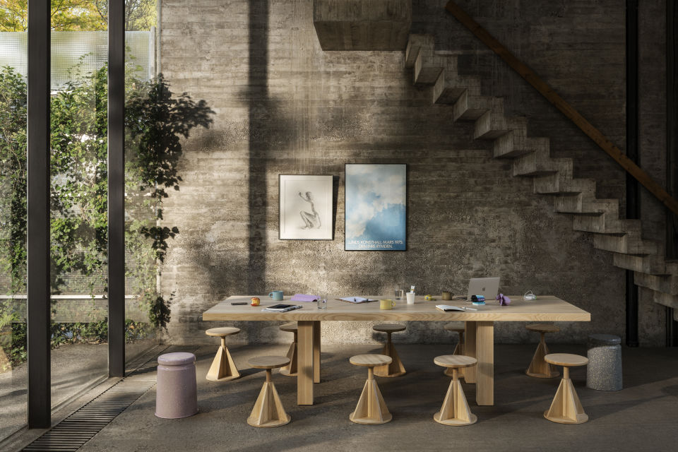 Lifestyle image of a dining scene featuring Max Table, Last Stools and All Wood Stools.
