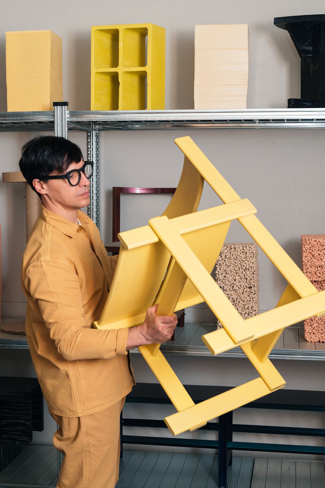 An editorial image from behind the scenes of making Bullnose Chair and Bullnose Lounge Chair by designer Marco Campardo.