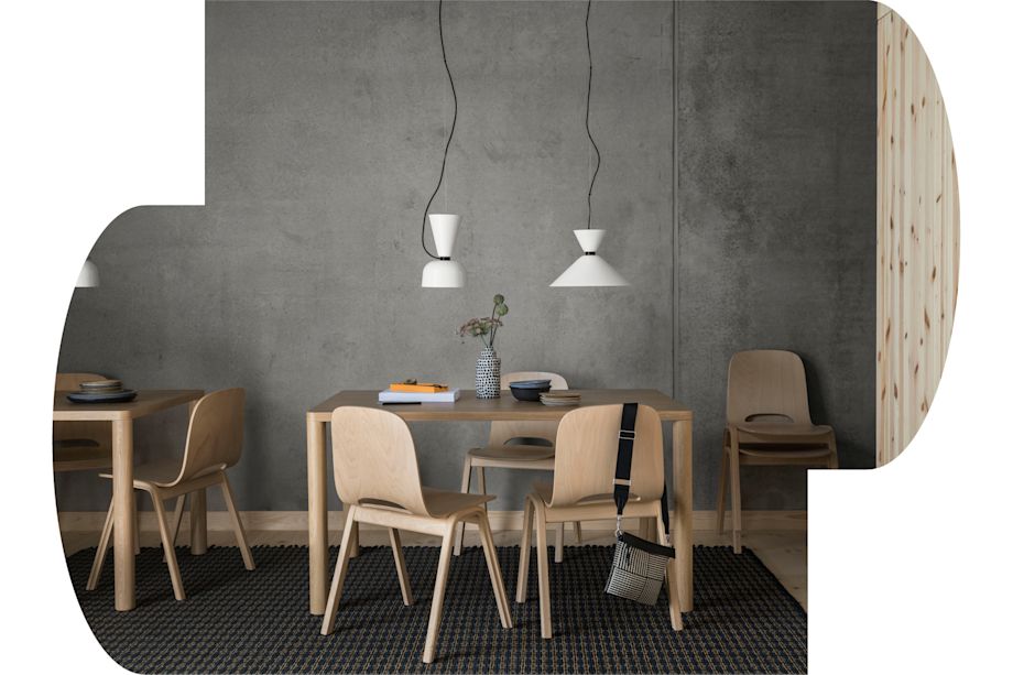 Hem - A lifestyle image featuring Log Table, Touchwood Chair, Alphabeta Pendant Light Duet, and Rope Rug.