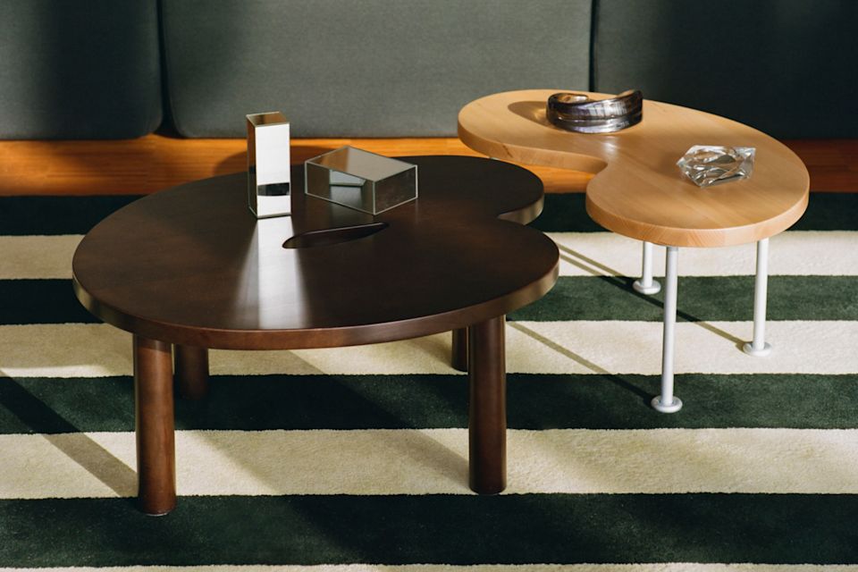 A lifestyle image featuring Pattern Rug and Worm Coffee Tables.