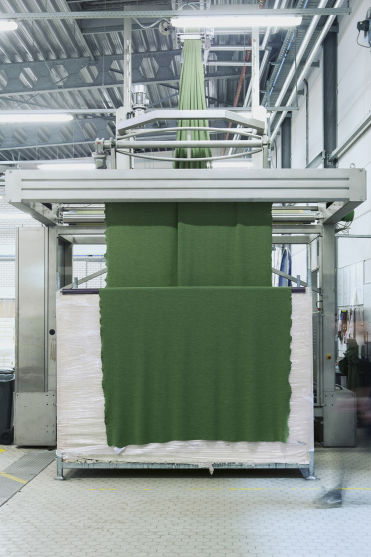 An editorial image from behind the scenes at the factory that produces fabric for Hem's Hai Lounge Chair and Bon Pouf.