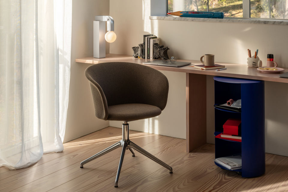 A lifestyle image of an office scene featuring Knuckle Table Lamp, Hide Pedestal and Kendo Swivel Chair 4-star Return.