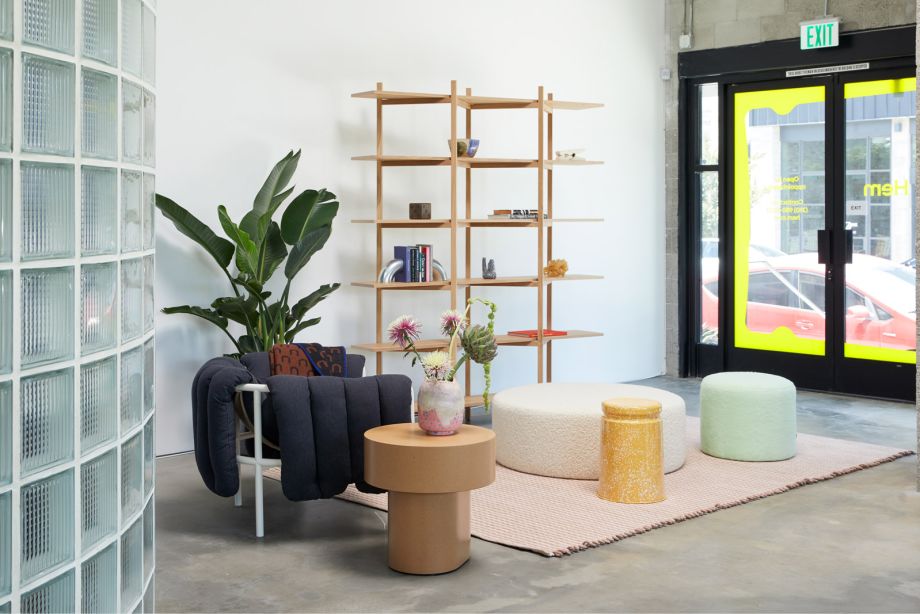 A lifestyle image from the Hem LA Showroom of Zig Zag High Shelf Oak, Puffy Lounge Chair, Stump Side Table Natural, Bon Pouf Round, Bon Pouf Round Large, Last Stool, Rope Rug and Arch Throw. 