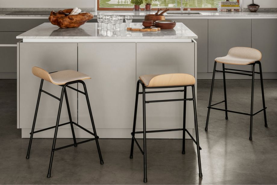 A lifestyle image of a kitchen scene featuring Touchwood Counter Stools.
