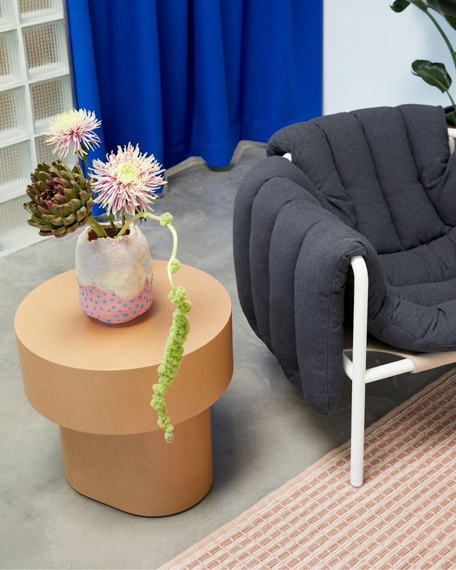 Hem LA Showroom image featuring Puffy Lounge Chair, Stump Side Table, and Rope Rug.