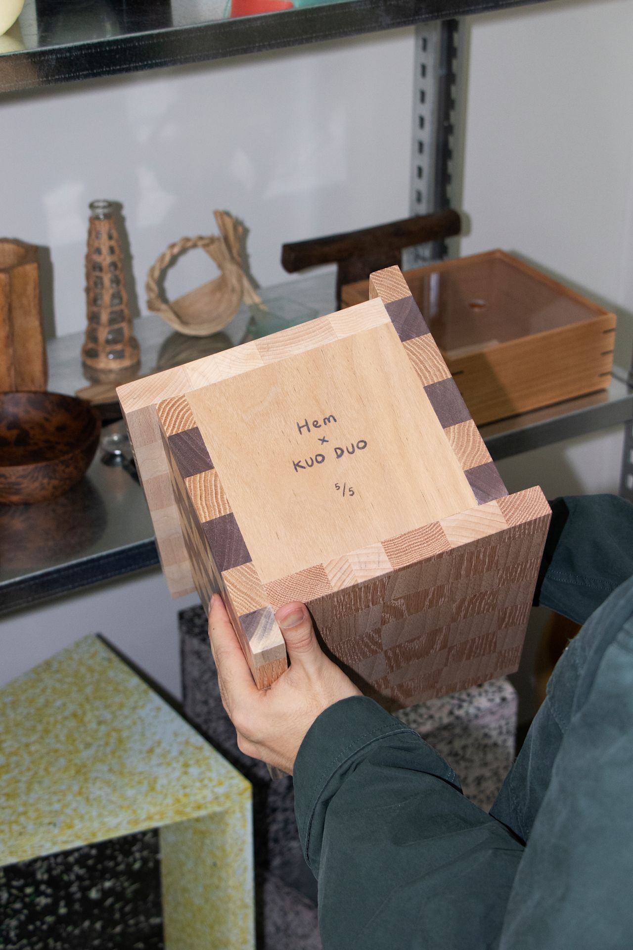 An editorial image from behind the scenes of making Mixwood Vessels, a Hem X limited edition piece by design group Kuo Duo.