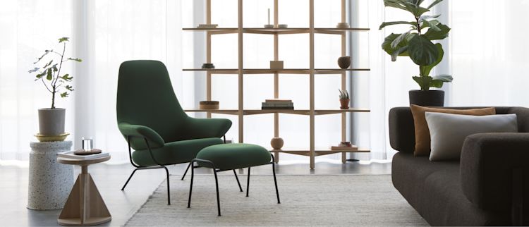 Hem - A lounge scene featuring Zig Zag High Shelf, All Wood Stool Rocket, Hai Lounge Chair + Ottoman, Dune Rug, Palo 2-seater Sofa + Armrests, Bon Pouf Cube, Key Side Table, and more.