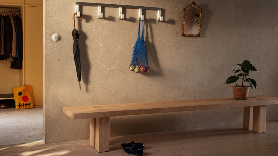 A lifestyle image of a hall featuring Tig Hook and Max Bench.