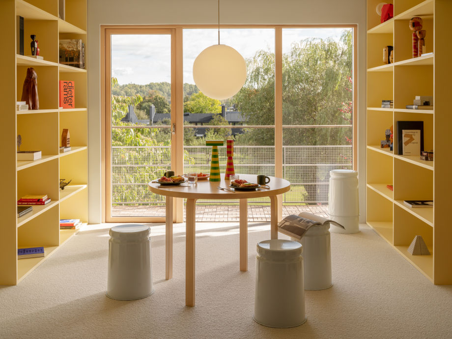 A lifestyle image of an office scene featuring Last Stools, Molino Grinders, and Coco Pendant Light.