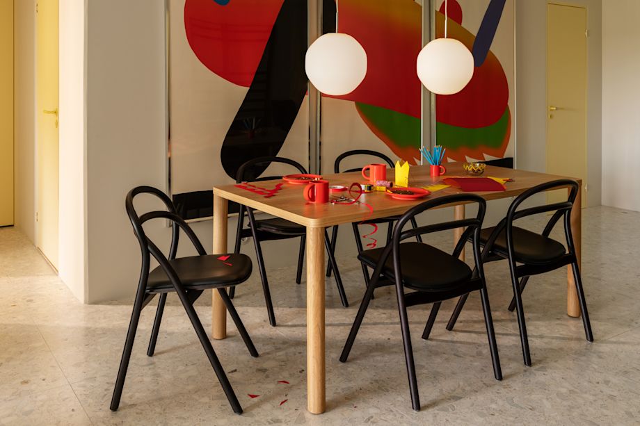 A lifestyle image of a dining scene featuring Coco Pendant Light, Log Table, Bronto Tableware, and Udon Chairs.