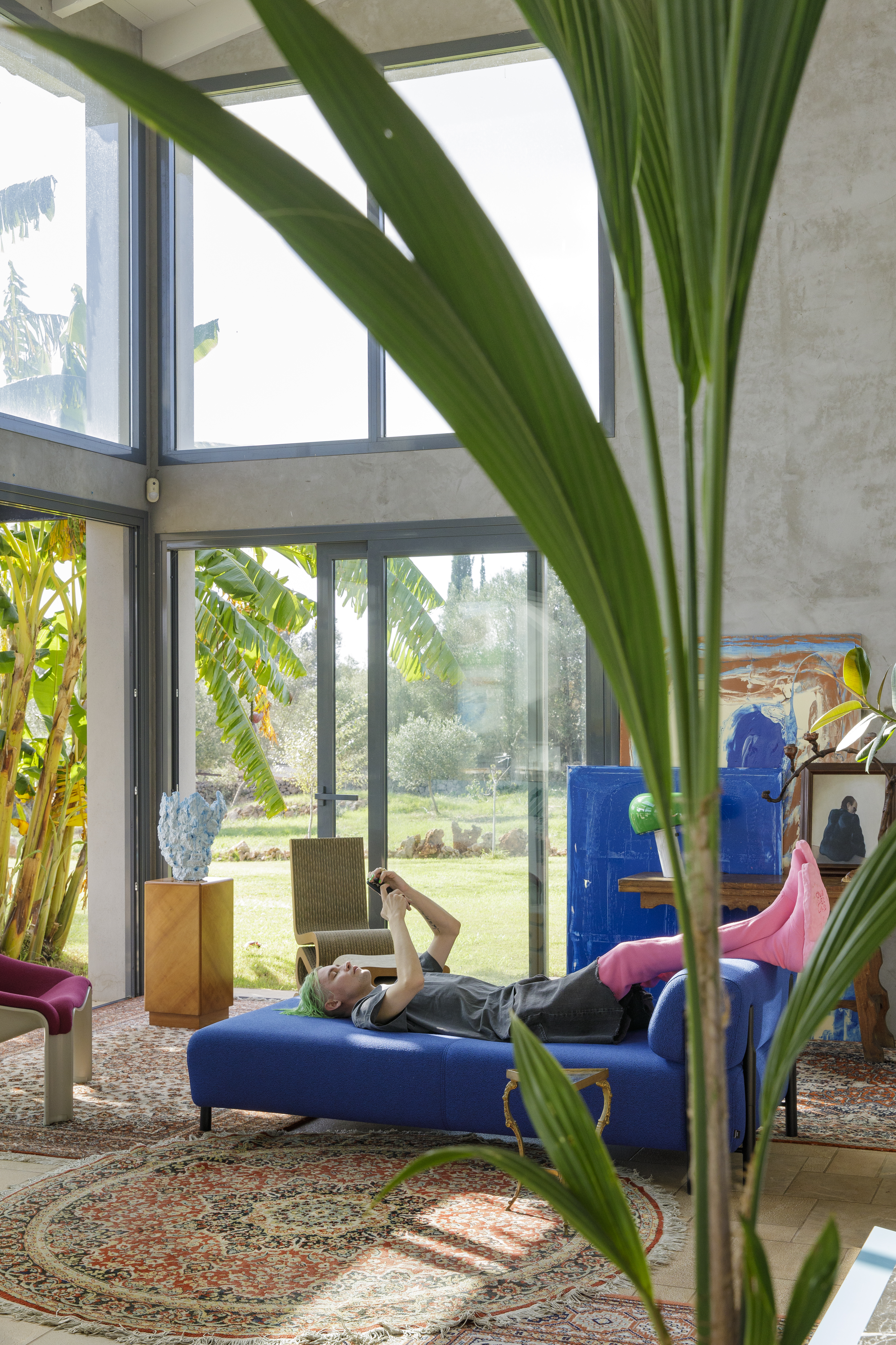 Achilles resting on our [Palo Modular Lounger Cobalt](/furniture/sofas-and-poufs/palo/20364)