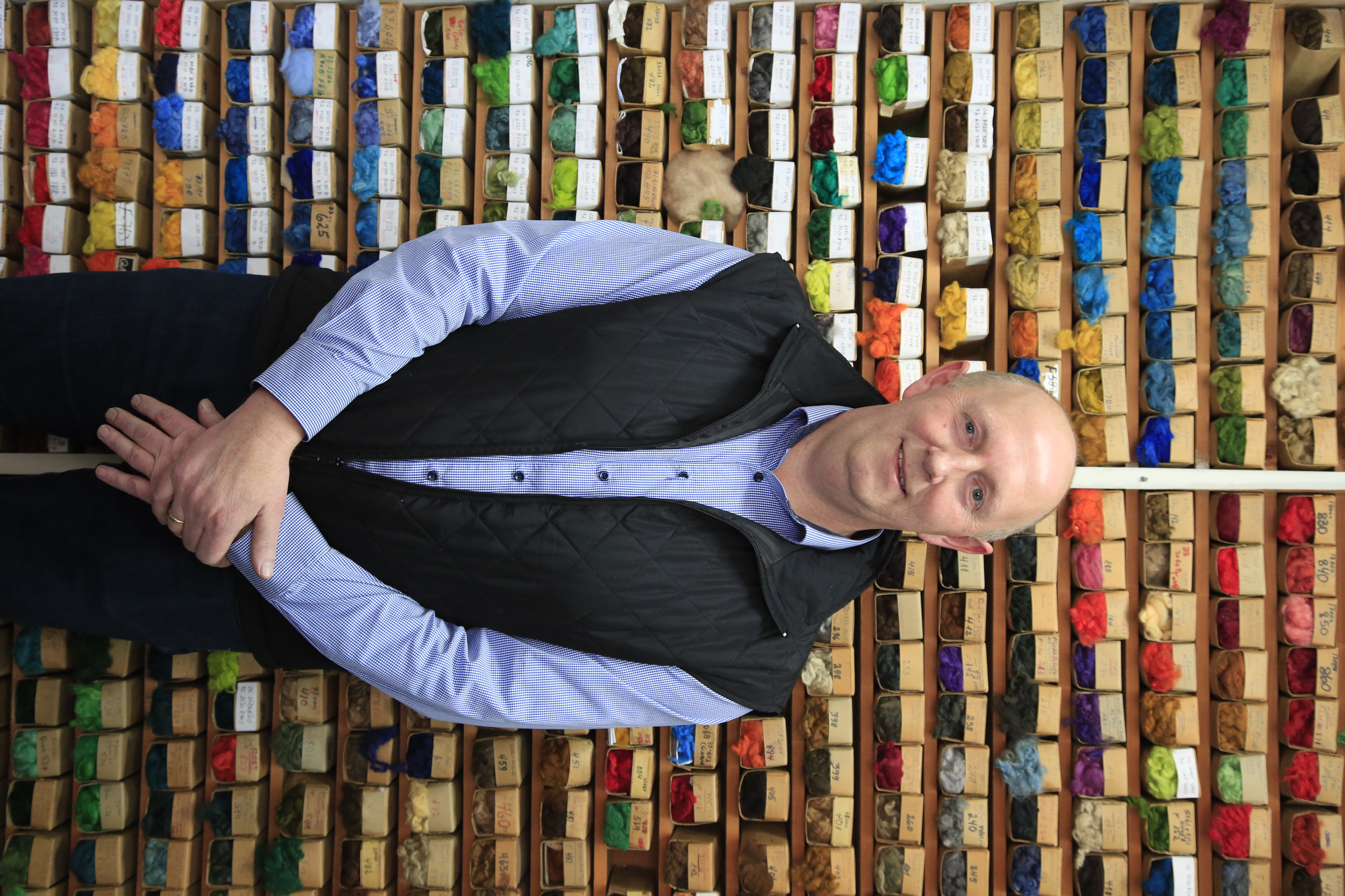 An editorial image from behind the scenes at the Palo Sofa textile factory.