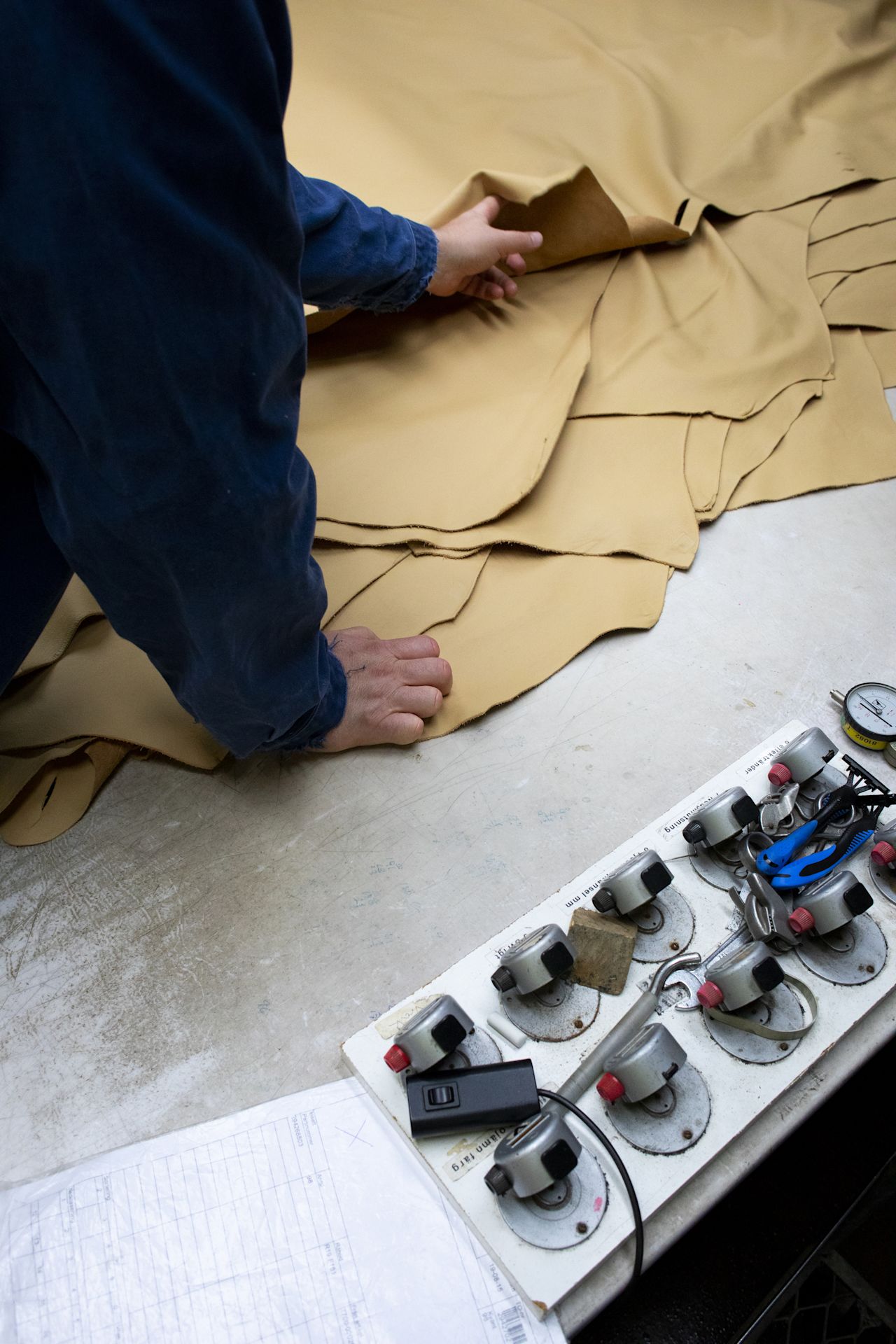 An editorial image from behind the scenes at Elmo Leather Factory.