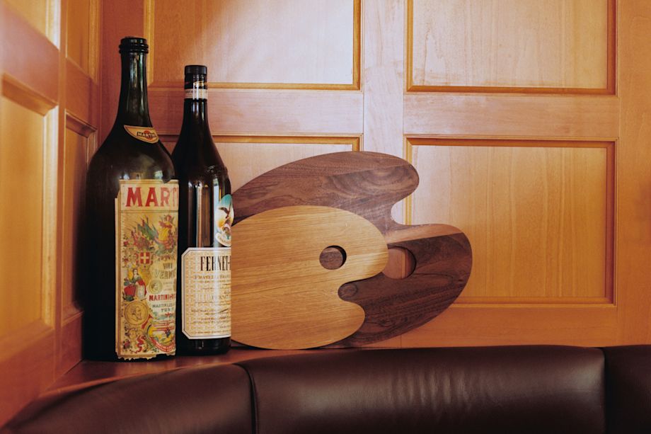 A lifestyle image of a dining scene featuring Palette Cutting Boards.