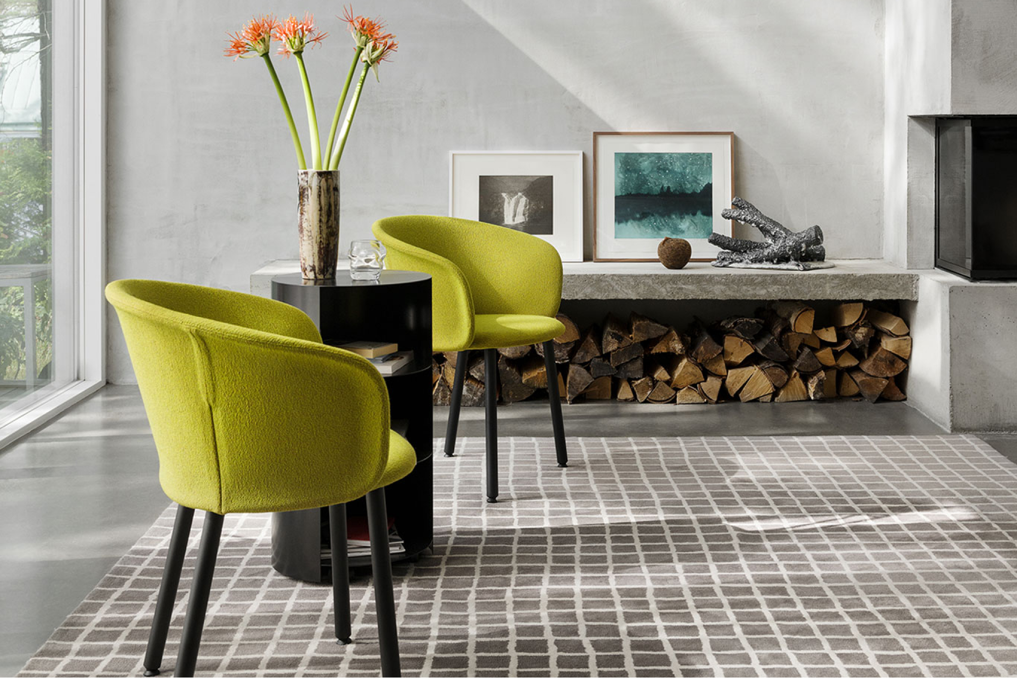 Hem - A living room scene featuring Kendo Chairs in Tivoli, Hide Pedestal Black, and Grid Rug Large.